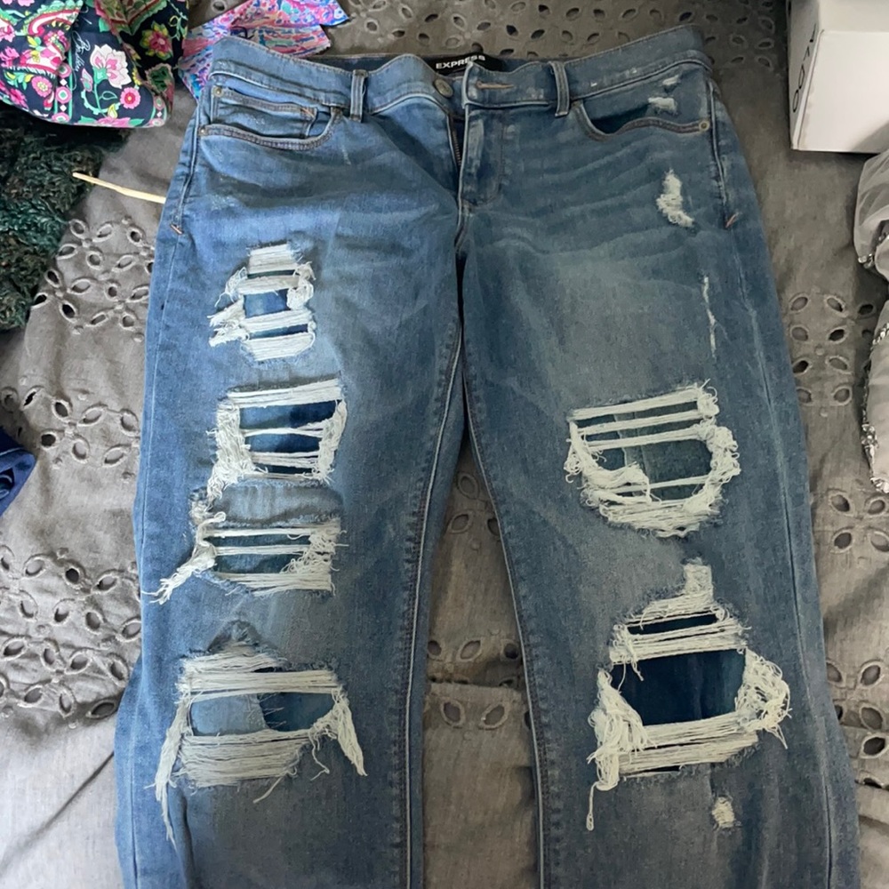 Ripped patched barely boot jeans.